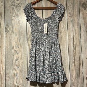 NWT Urban Outfitters comfortable floral summer mini dress. Size: Small